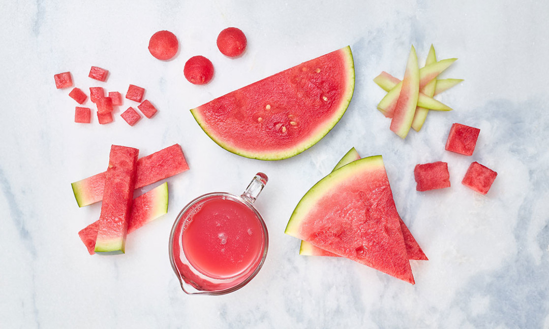 watermelon cuts on marble slab, wedge, cuts of rind, chunks, juice, sticks, dice and balls