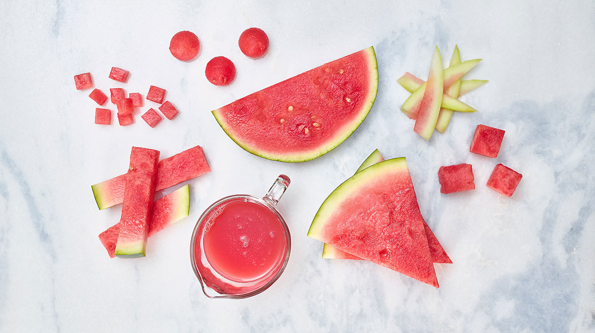 watermelon cuts on marble slab, wedge, cuts of rind, chunks, juice, sticks, dice and balls