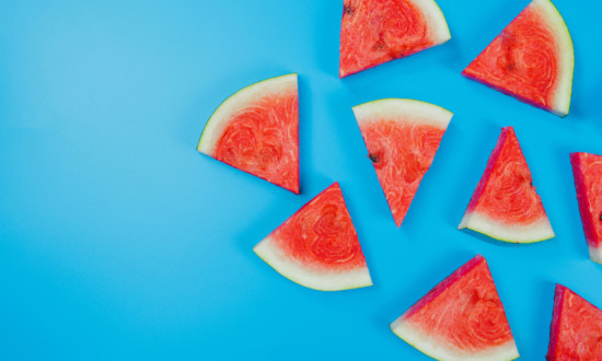 watermelon triangular cuts on right side of blue background