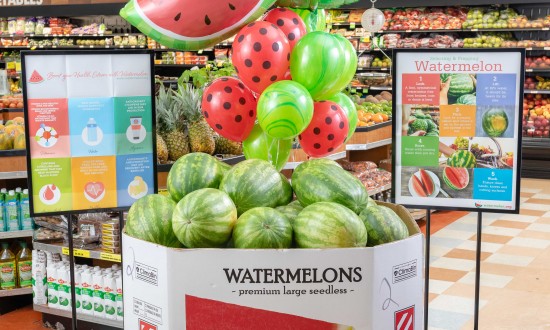 retail display - watermelon in bins with two NWPB posters, Selection & Health Esteem. Balloons part of display
