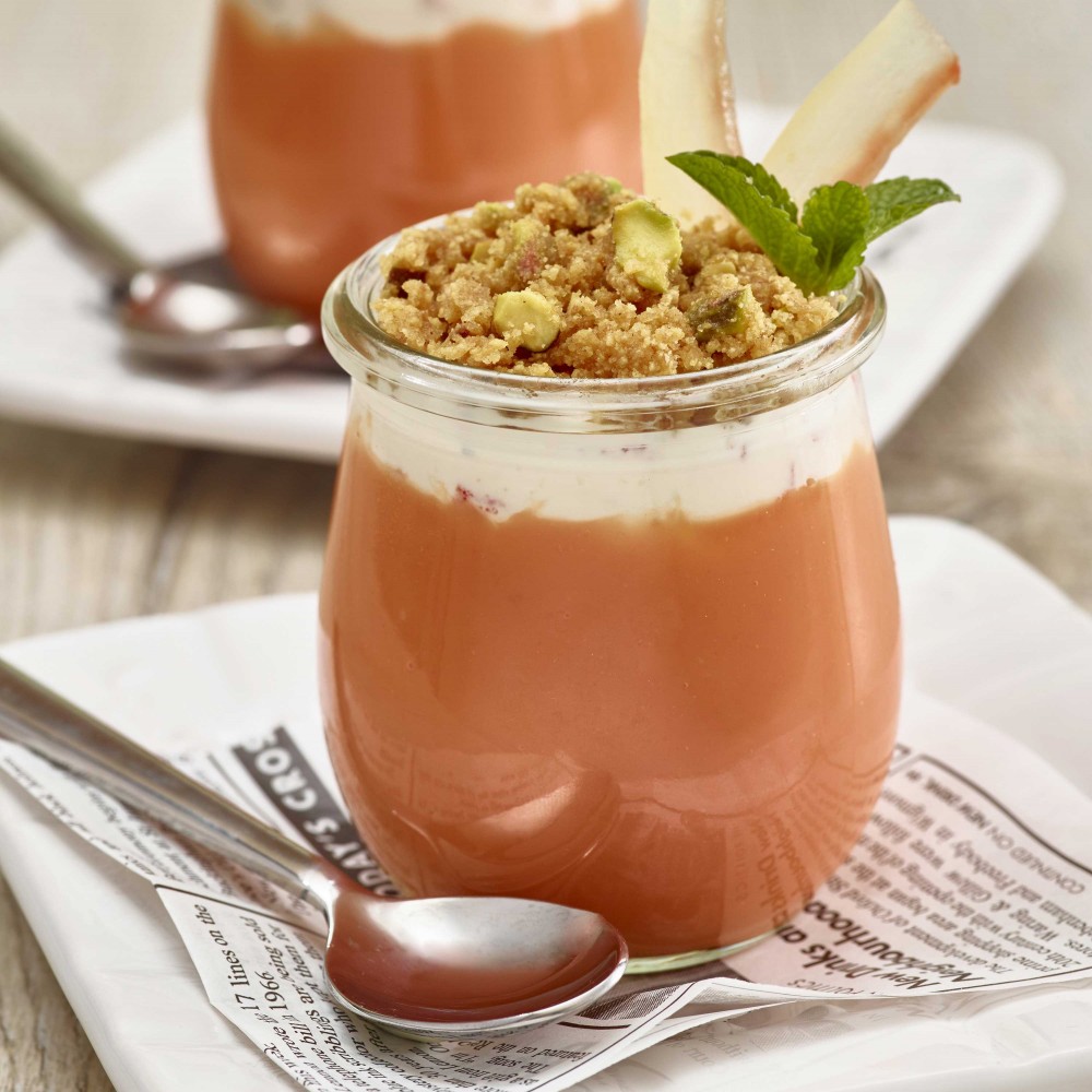 Watermelon Pudding (x2) each set in small clear jars on small dessert plates with spoons