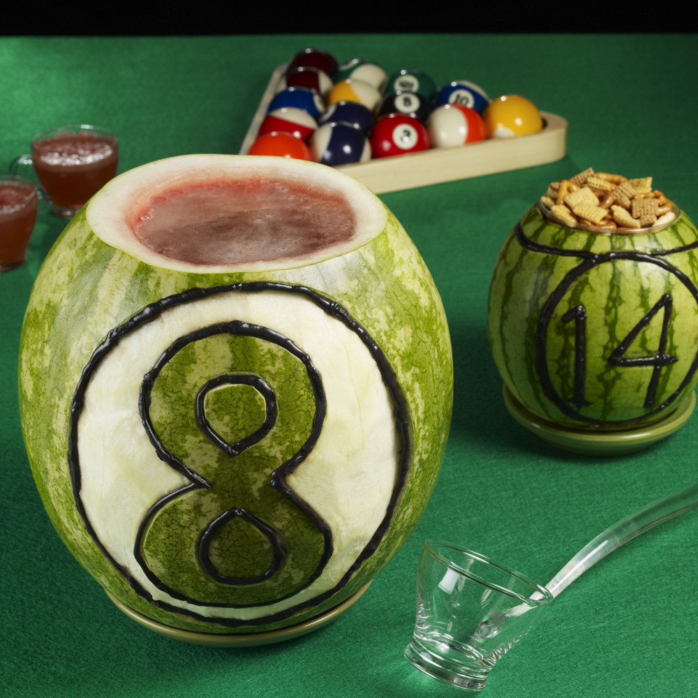 8 ball punch bowl on a pool table