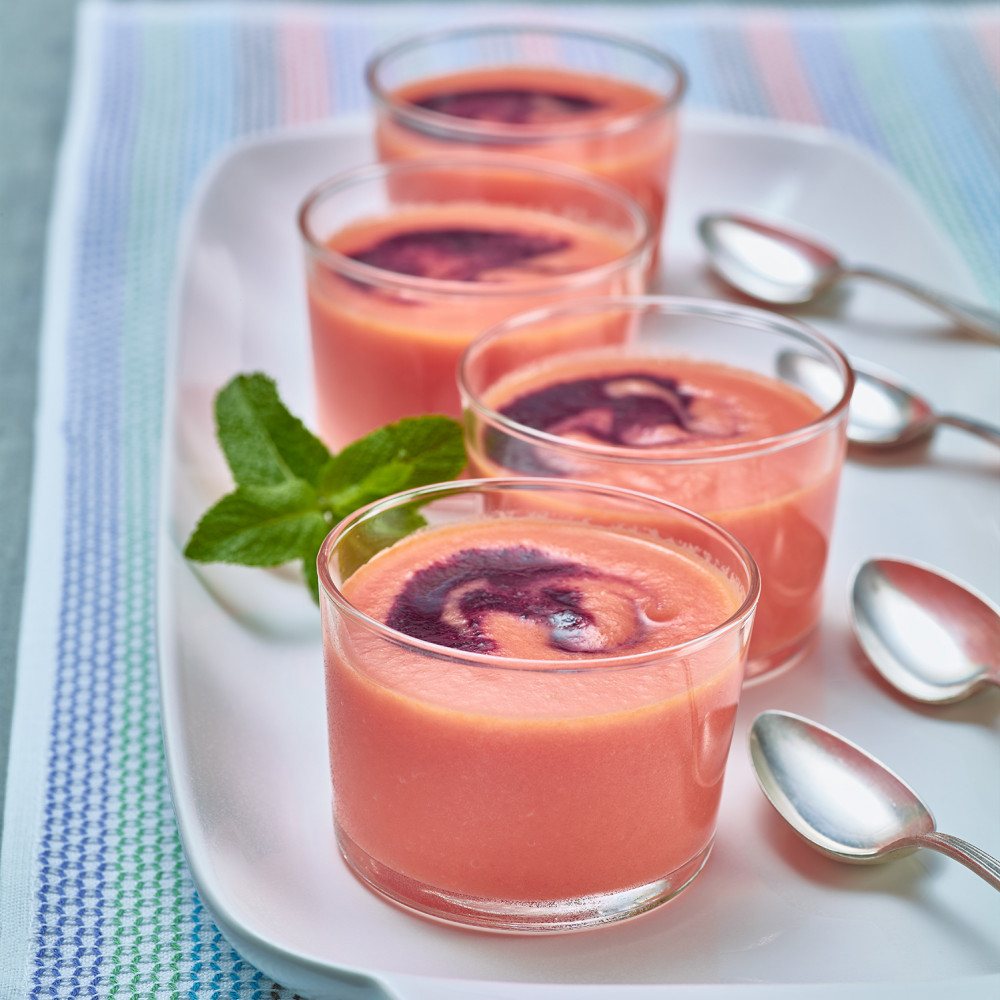 Four bowls of prepared watermelon soup