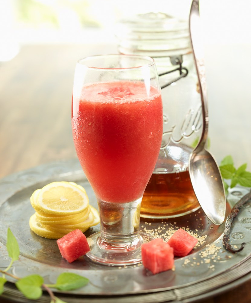 Chunky watermelon lemonade on tray with ingredients