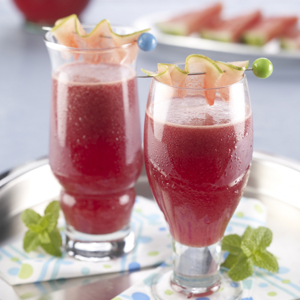 Two glasses of watermelon green tea punch