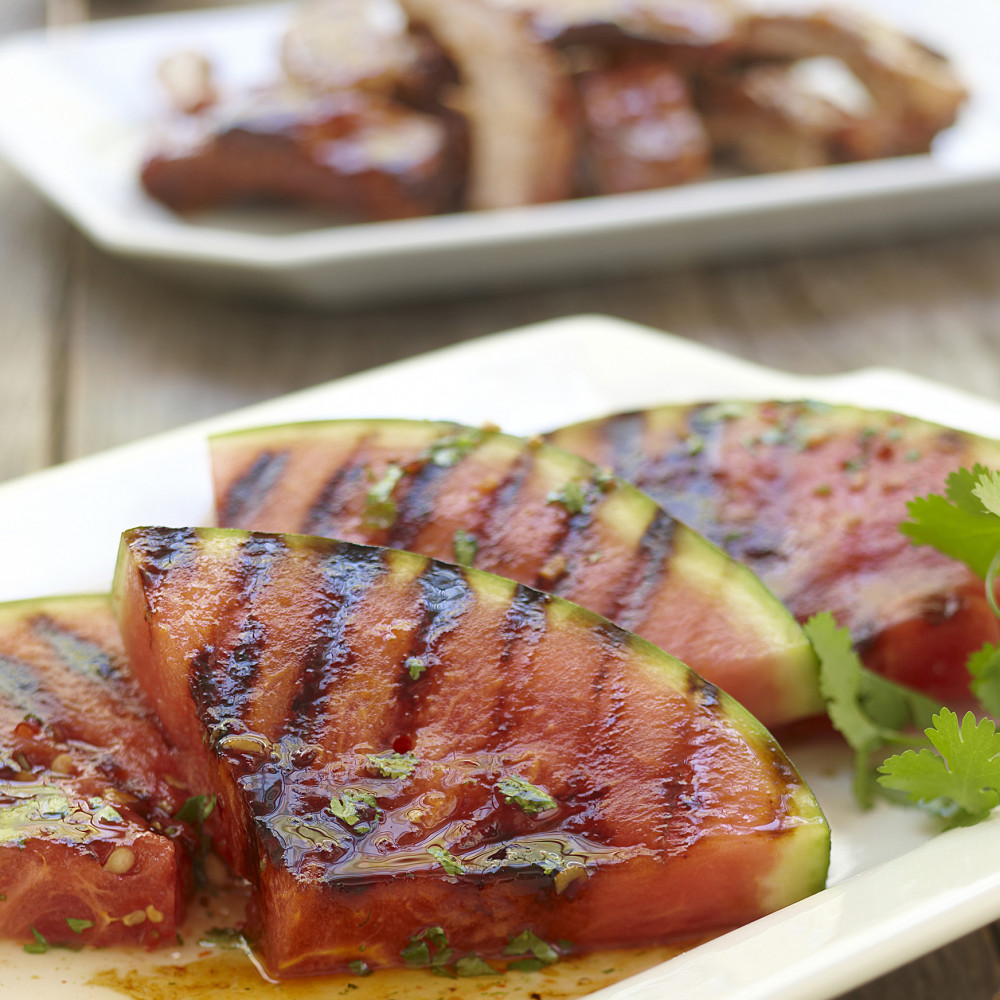 Grilled watermelon slices on plate