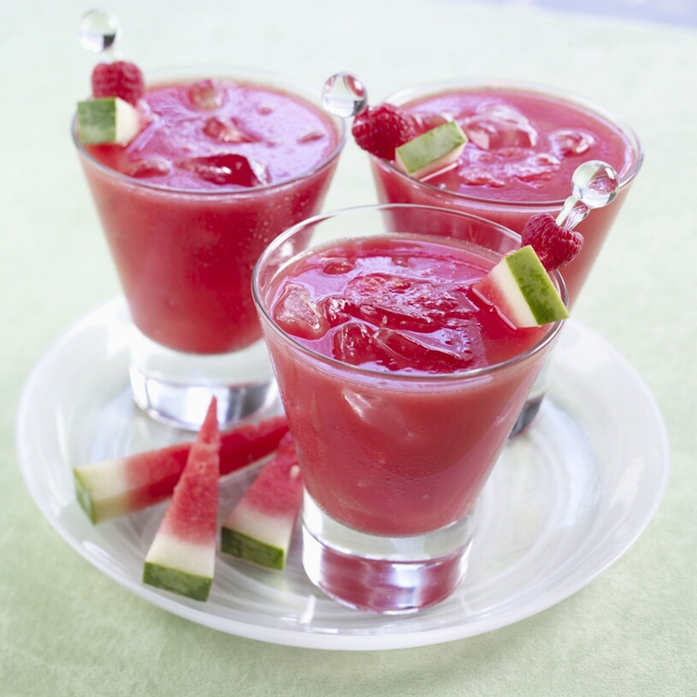 Three watermelon raspberry lemonade drinks