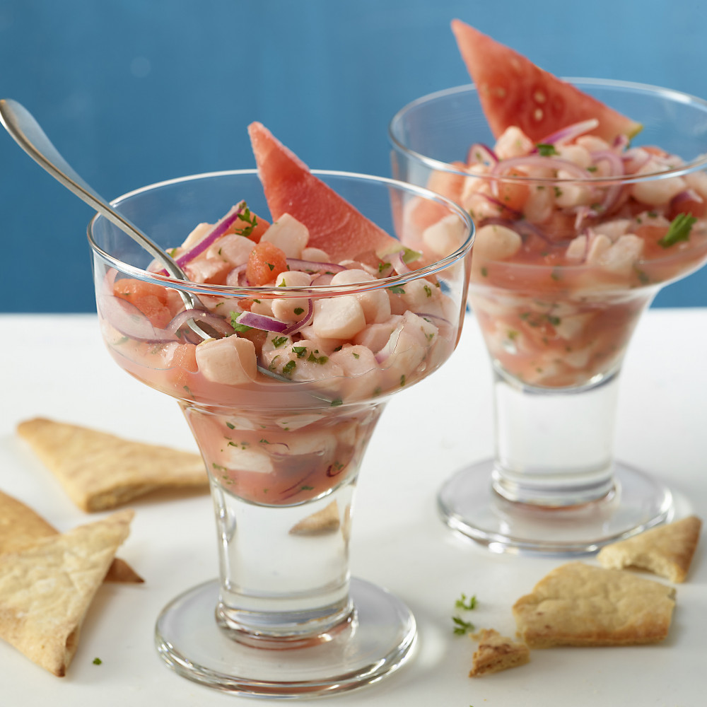 Glasses of ceviche and crackers