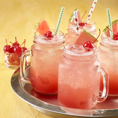 Shirley temples in jar glasses on a tray
