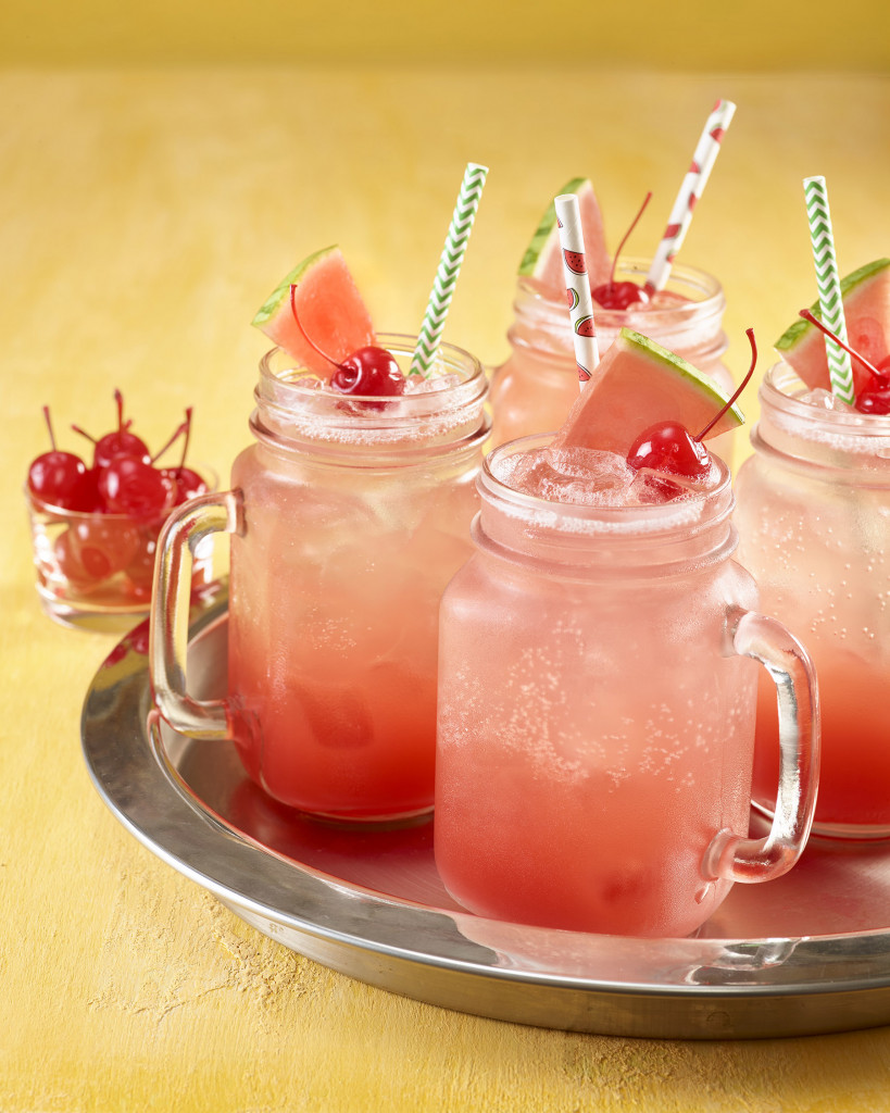 Shirley temples in jar glasses on a tray