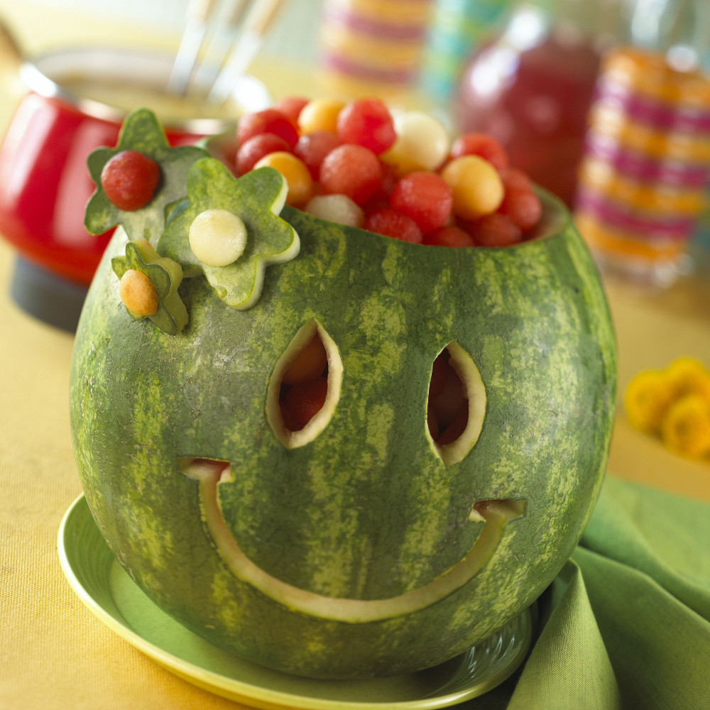 Smile, as bowl, filled with watermelon balls.