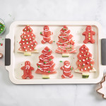 Holiday cookie cutouts of watermelon with icing and sprinkles