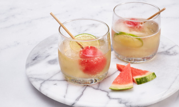 Two glasses of prosecco with frozen watermelon ice pops