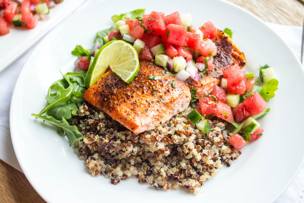 Salmon on a bed of quinoa and watermelon salsa