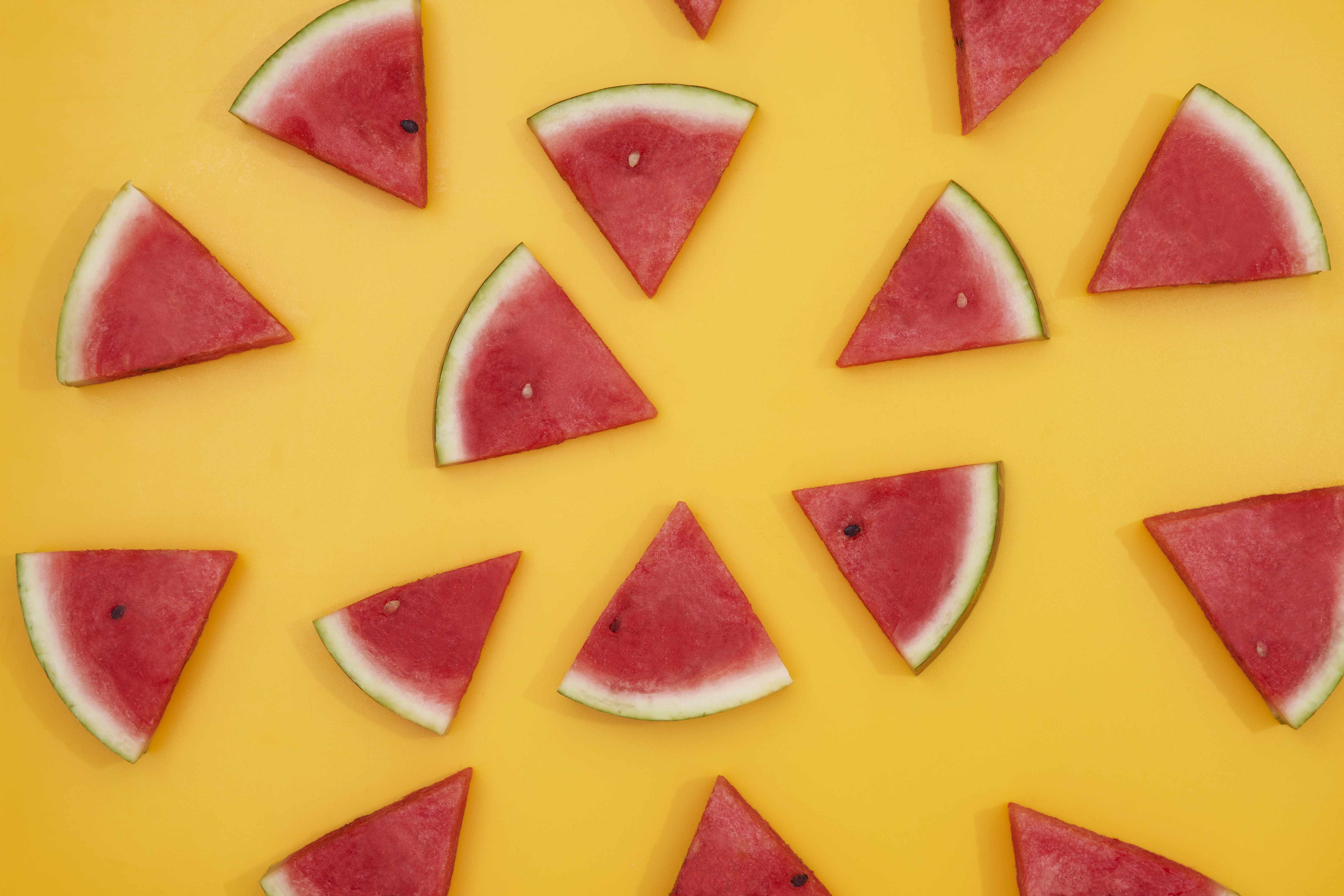 scattered slices on a yellow background