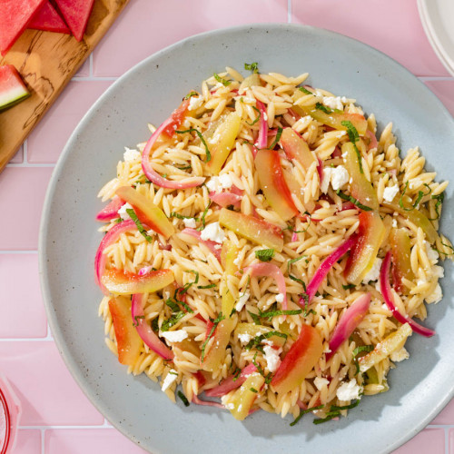 orzo pasta salad with pickled watermelon rind, pickled onions and feta