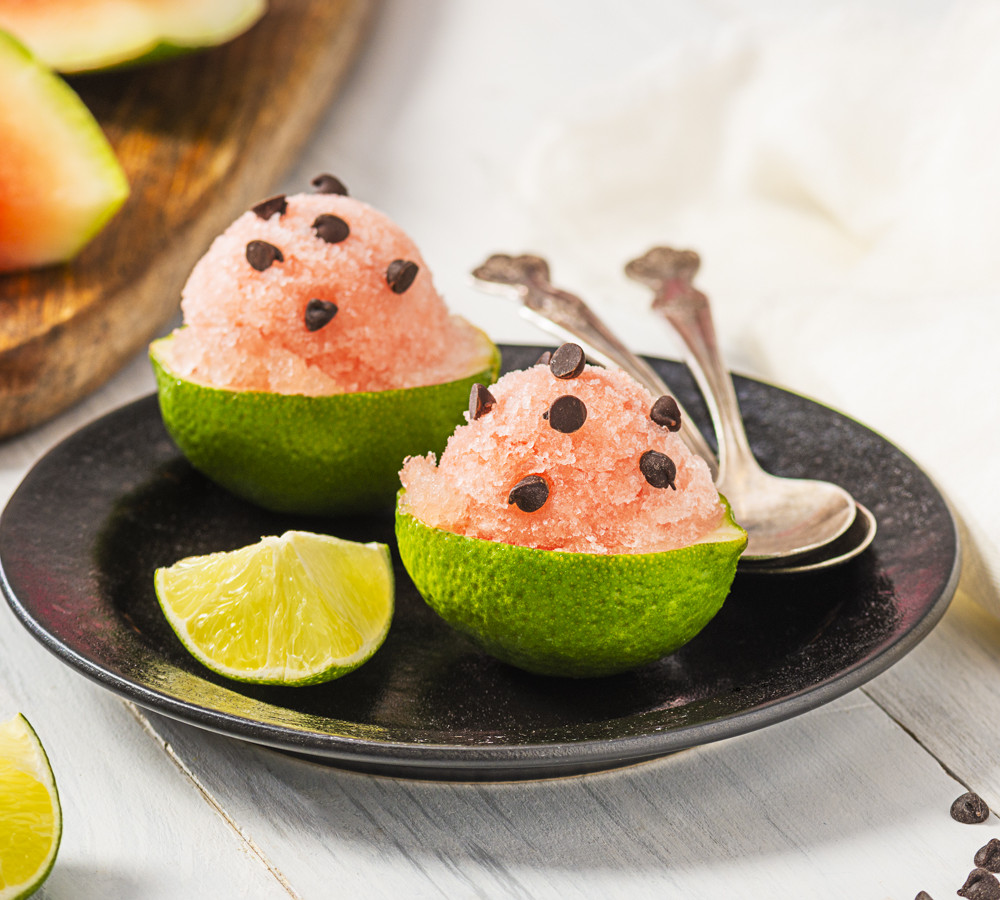 watermelon granita in half limes with mini chocolate chips
