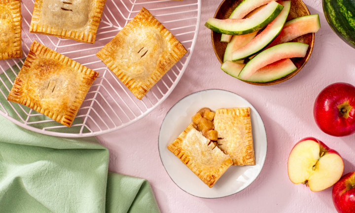 watermelon rind and apple hand pies on a platter and plate