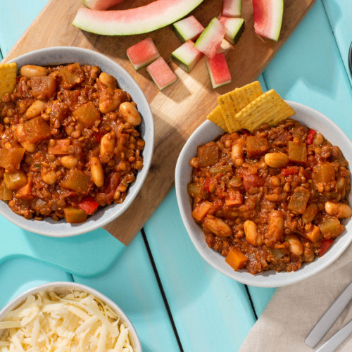 two bowls of chili made with watermelon rind and lentils