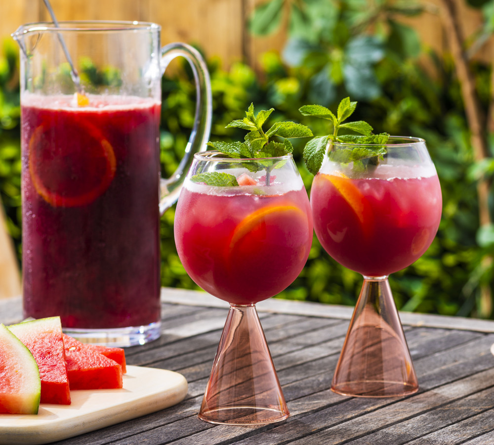 watermelon sangria in glasses on a picnic table