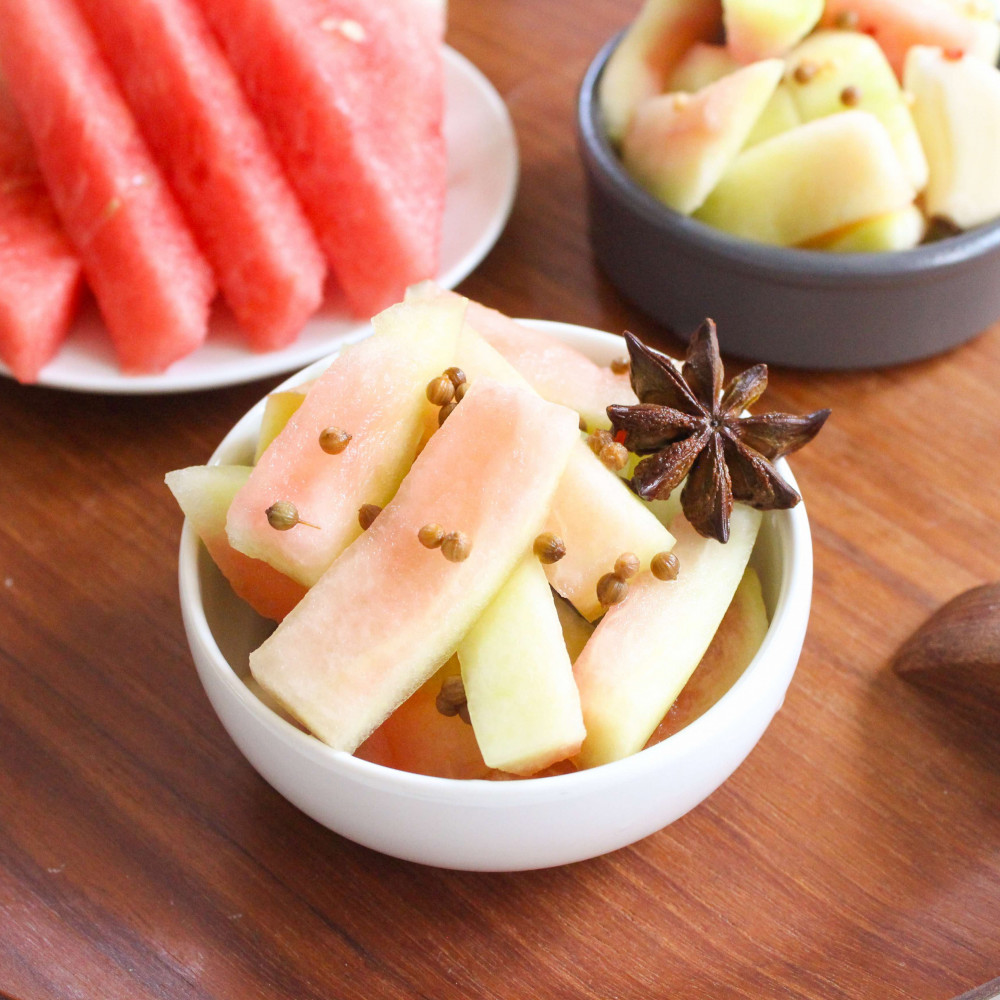 Fermented Watermelon Rind Pickles with spices in a bowl