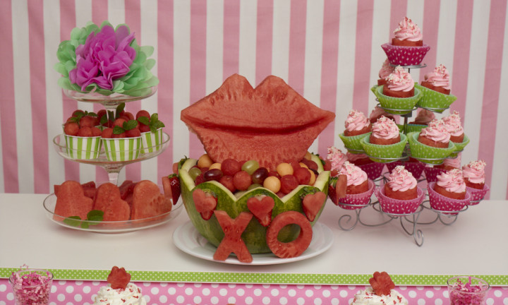 Valentine party spread with watermelon cupcakes, cuts and a lips and love carved watermelon basket