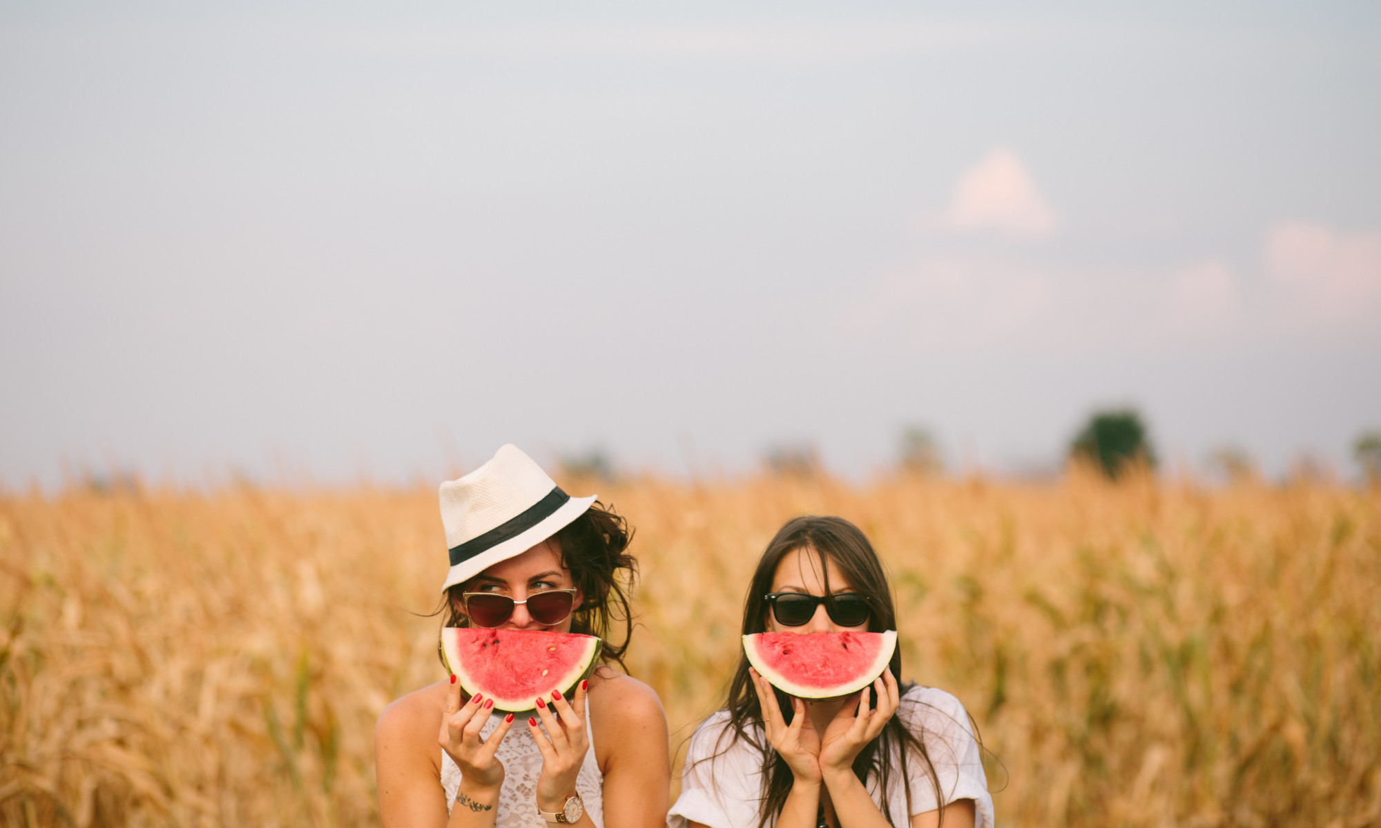 Girls in a field with slices