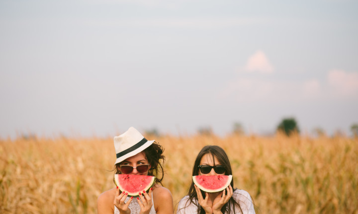 Girls in a field with slices