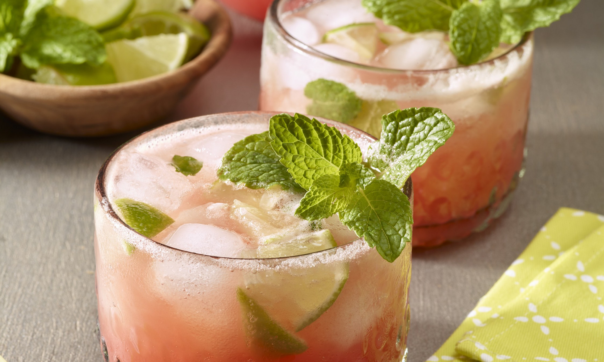 Watermelon, lime and mint mocktails with ice.