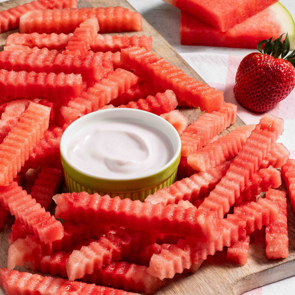 Watermelon cut into crinkle cut "fries" with dipping sauce