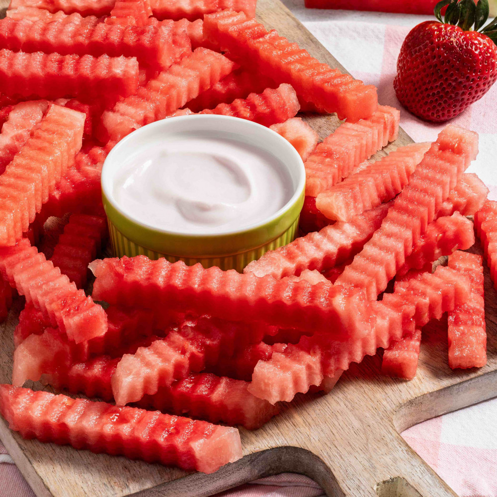 Watermelon cut into crinkle cut "fries" with dipping sauce