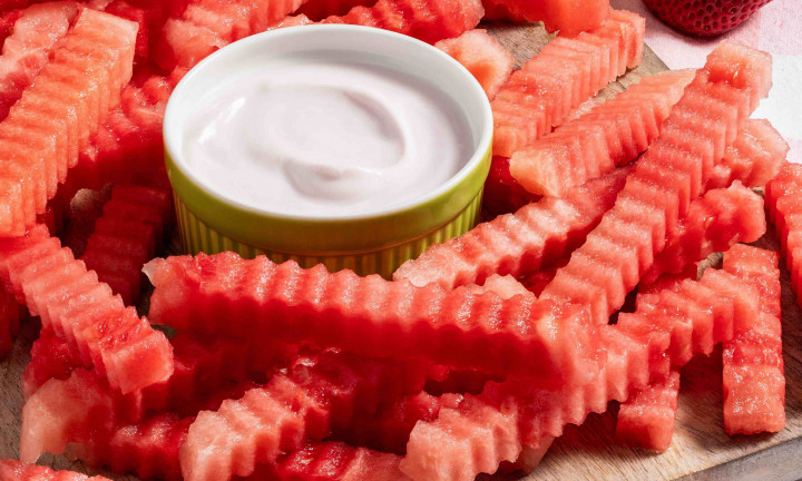 Watermelon cut into crinkle cut "fries" with dipping sauce