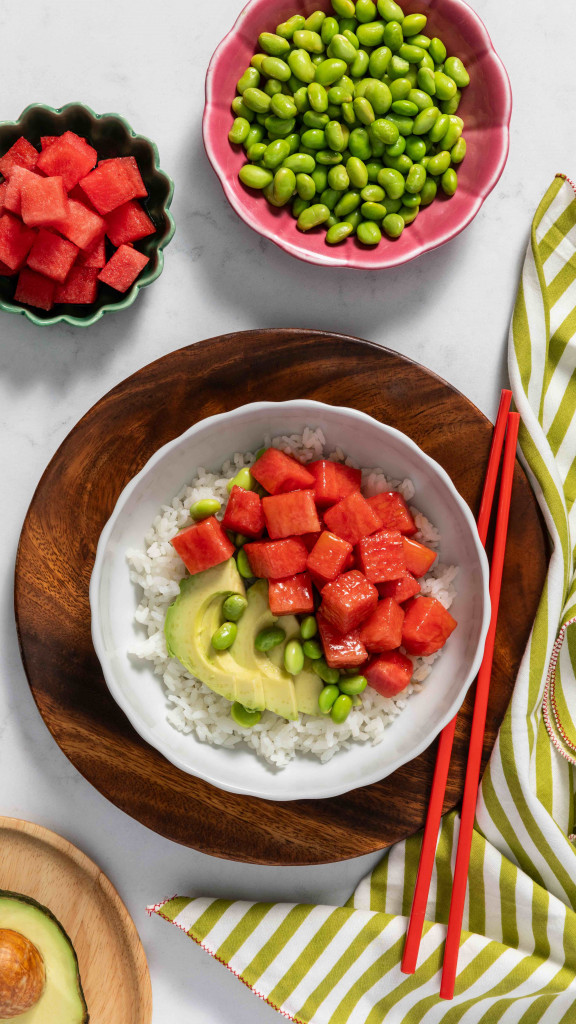 Marinated watermelon that looks like tuna with avocado, edamame and rice in a bowl