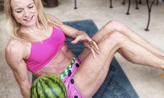 Girl sitting and holding watermelon doing twists