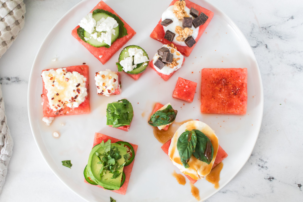 Watermelon flavor pairing flight on a white plate on a white marble background.